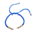 Handcrafted blue woven bracelet with adjustable gold beads and drawstring closure - Bracelet: 41