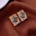 Detail of vintage enamel pearl earrings with light blue gemstone in gold setting - Golden Square Light Green Gem Stud Earrings (HE20922-7)