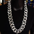 Bold silver chunky Cuban link necklace for hip hop performers on a black mannequin - 80cm Length / Silver