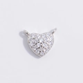 Macro detail of silver heart charm with cubic zirconia inlay for jewelry making - Platinum Color Double-Loop Heart Pendant