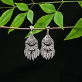 Detailed view of silver ethnic earrings with hollow patterns and leaf-shaped pendants - E4976-2 (Waterdrop Hollow)