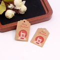 Close-up of kraft paper Christmas gift tags with red snow cabin prints and twine holes - Style 6/Snowy Cabin / 3*5cm [100Pcs]