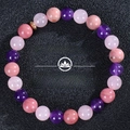Macro detail of 8mm natural pink and purple crystal beads with gold spacer on elastic cord - Pink Purple Gold Spacer Combination (Anxiety & Stress-5)