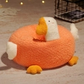 Orange goose plush pet bed cushion with white furry details and yellow webbed feet - Orange