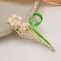 Detail of floral hair claw clip with pink petals, green leaves and pearl accents - Champagne