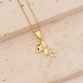 Detailed view of a gold bear pendant with clear cubic zirconia and black eye accents - Clear Zircon Bear with Black Eyes (9#)