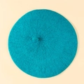 Knitted beret in bright teal blue-green with classic top stem for women - M / Deep Lake Blue