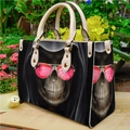 Vintage black printed leather tote bag with skull graphic on a natural outdoor background - Gothic Pink Sunglasses Skull (Handbag 0046)