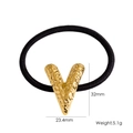 Coletero elástico negro con un accesorio en forma de V de acero dorado texturizado - Estilo Letra V