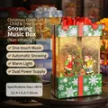 Green Christmas gift box music box with glowing snow globe and festive tree scene - Green Children & Tree