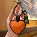 Orange heart-shaped leather keychain with black border and matching spring lanyard - Leather-Orange Heart