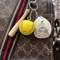 Detailed view of mini baseball keychain with yellow ball and glove on a stylish bag - 3.5CM Yellow/White Set