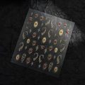 Detail of 5D embossed nail stickers with gold sunburst stars and red heart patterns - Red Heart Sunburst Style (CO-554)