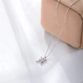 S925 silver Pisces zodiac pendant necklace with sparkling gems on white fabric - Pisces Silver Color