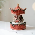 Carillon carosello rotante con Babbo Natale e fiocchi dorati, altezza 16 cm - Giostra Musicale Stile B