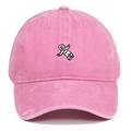 Close-up of pink washed cotton baseball cap with detailed astronaut embroidery - Pink