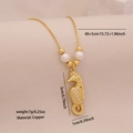 Gold seahorse pendant necklace with pearls and rhinestones on a minimalist beige background - 2# Seahorse Style (2#海马)