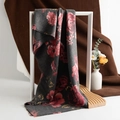 Dark grey cashmere shawl scarf featuring a large red rose floral print and fringe edges - Rose Dark Grey
