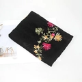 Black lightweight scarf featuring vibrant floral embroidery in a folded presentation - 170x90cm / Ink Black