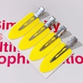 Set of four bright yellow leaf-shaped hair clips for styling on white card - Set of 4 / Yellow