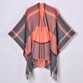 Close-up of orange and gray plaid pattern on a tassel shawl with woven jacquard texture - Gray Pink Plaid With Tassels