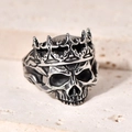 Macro shot of punk style stainless steel skull ring featuring an intricate crown detail - US 9 / Black Steel