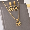 Set gioielli farfalla dorata con ciondoli neri circolari e orecchini abbinati - Set con Zirconia Nera