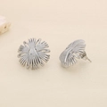 Macro shot of silver geometric flower stud earrings made of high-quality titanium steel - Steel Radial Flower Style (KE116349-KFC)
