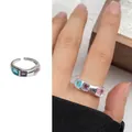 Adjustable 925 silver ring featuring three colorful square gemstones in light blue and purple - 228 Colorful Zircon