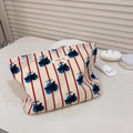 Detail of red striped cotton cosmetic bag with cute rabbit prints and zipper closure - White Red Stripe Rabbit