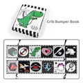 Macro view of high-contrast black and white baby cloth book with various sensory patterns - Crib Bumper Cloth Book