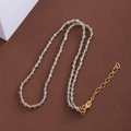 Short beaded necklace with faceted gray natural stones and golden metal accents - 3MM Diameter / Moonstone