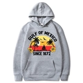 Heather grey Gulf of Mexico sunset hoodie with palm trees and sailboat print in center - Light Gray