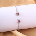 Adjustable silver open bangle featuring rectangular and teardrop red gemstones - Rose Red