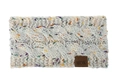 Gros plan d'un bandeau en maille torsadée crème avec pois colorés et étiquette MOK - Beige chiné