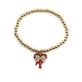 Bracciale elastico dorato con ciondolo a cuore di bastoncino di zucchero e fiocco - Bastoncino di Zucchero a Cuore