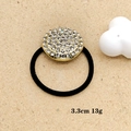 Detail view of 3.3cm sparkling rhinestone ball hair tie with black elastic band - Golden Semicircle Rhinestone