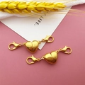 Golden heart-shaped magnetic jewelry clasp with lobster hooks on pink background - Gold Heart Magnetic Clasp / 11x43mm