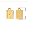 Macro view of golden stainless steel math formula pendant with dimensions 17x10mm - Gold Math Formula 2+2=4 Tag