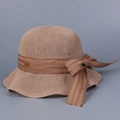 Detailed view of khaki knitted sun hat featuring a textured weave and elegant ribbon bow - M (56-58cm) / Khaki