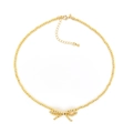 Gouden kralenketting met strikhanger, verstelbare verlengketting en karabijnsluiting - Strik Ketting / Goud