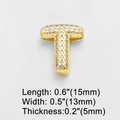 Macro shot of gold letter T charm pendant with cubic zirconia inlay and dimensions - Letter T