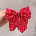 Vibrant red and white polka dot fabric bow hair clip with a sweet retro style - Polka Dot / Burgundy