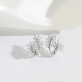 Elegant silver leaf stud earrings with marquise-cut zircons on a white silk background - Leaf / Silver