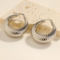 Chunky silver C-shaped hoop earrings with textured spiral thread pattern - Hollow Striped Round Hoop Earrings / Steel