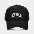 Detailed close-up of white 3D embroidery on washed black denim baseball cap - Adjustable / Black