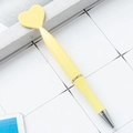 Minimalist yellow heart-shaped swivel ballpoint pen with silver metal accents for office - Candy Yellow