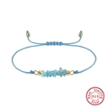 Dettaglio di un bracciale in pietre naturali azzurre con perline in argento 925 dorato - Acquamarina Naturale