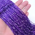 Primo piano della tenda a fili viola con fili d'argento scintillanti in mano - 100*200cm / Violetto
