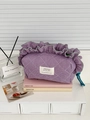 Borsa da trucco trapuntata a scacchi viola con bordo smerlato e nappa con cordoncino - Viola